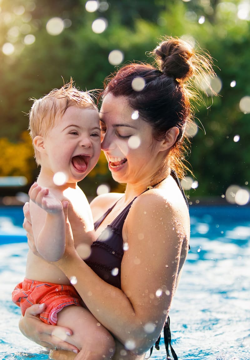Baby and mother in a pool